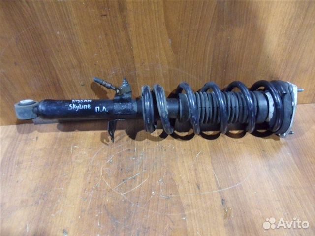 Амортизатор передний левый Nissan Skyline KV36