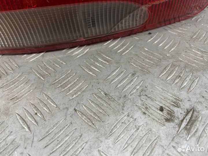 Фонарь левый Митсубиши Мираж 1993