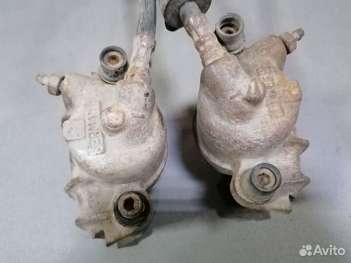 Суппорт тормозной передней VW Jetta II 1986