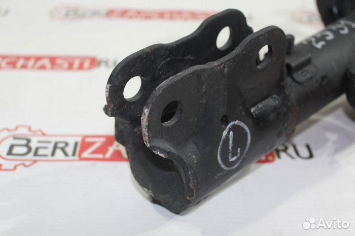 Амортизатор передний левый Mitsubishi Lancer 10