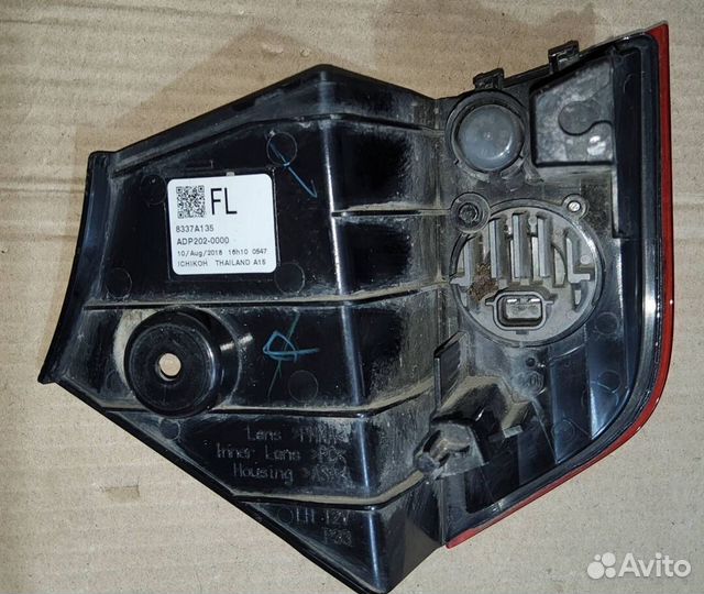 Фонарь задний в бампер левый Mitsubishi Pajero Spo