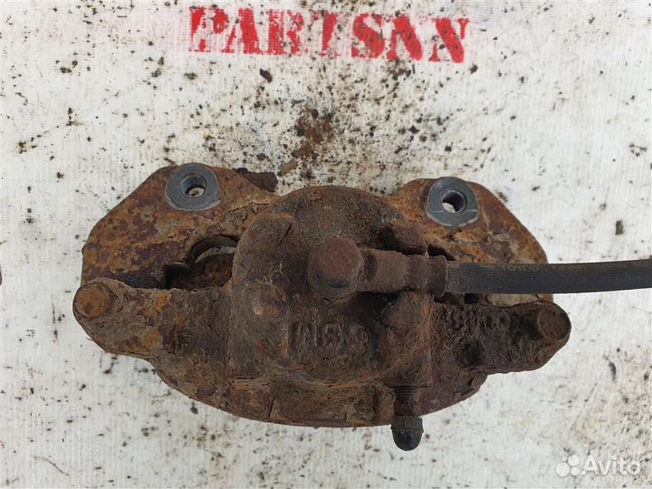 Суппорт передний левый Митсубиши Лансер 9