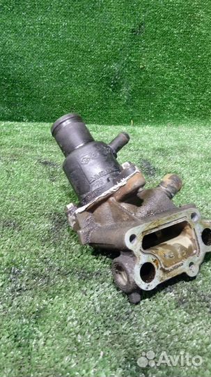 Корпус термостата Renault Logan