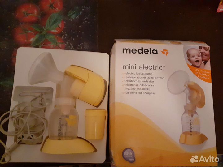 Молокоотсос medela электрический