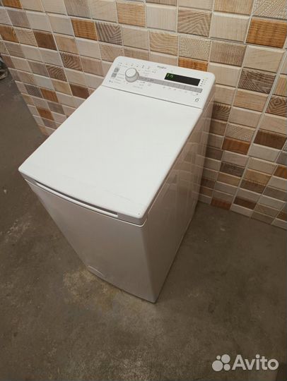 Стиральная машина с вертикальной загрузкой