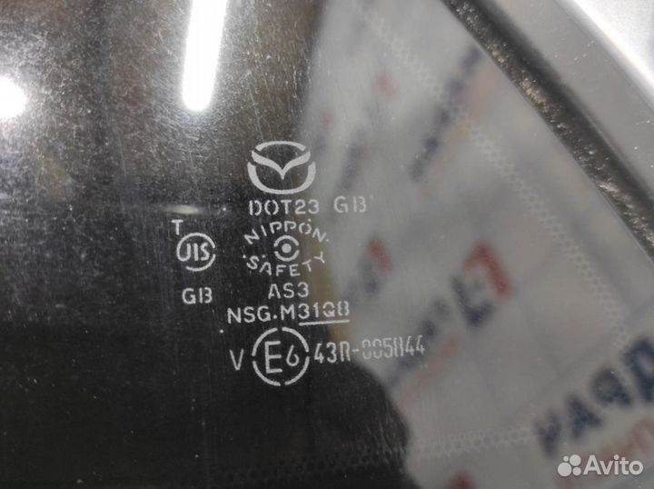 Стекло кузовное глухое левое Mazda CX-7 EG22-63-95