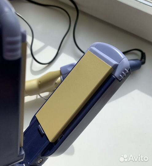 Щипцы для завивки волос philips