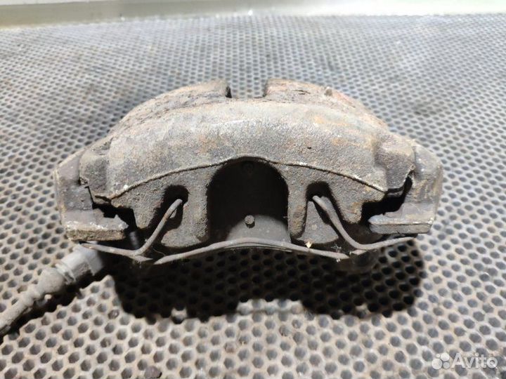 Суппорт передний передний левый Volkswagen Passat