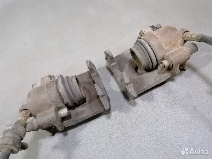 Суппорт тормозной передней VW Jetta II 1986