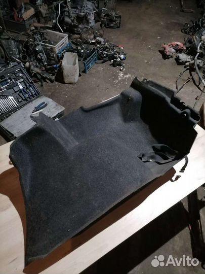 Обшивка багажника левая Мазда 3 бк