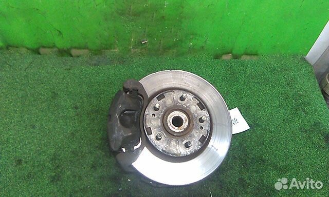 Кулак поворотный левый Mitsubishi Chariot Grandis