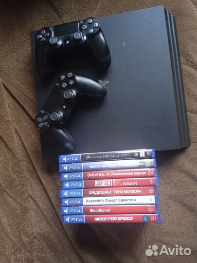 Sony playstation 4 pro 1tb + 1 геймпад + 8 игр