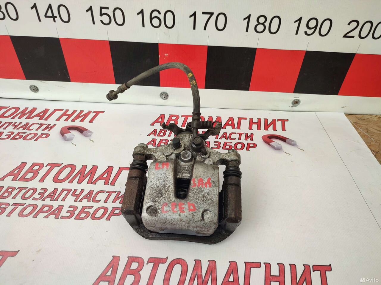 Супорт тормозной задний левый Киа Сид 3 CD 18-н.в