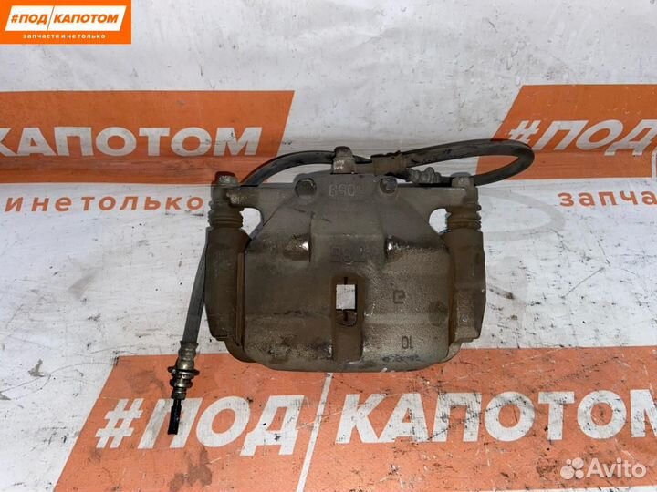 Суппорт тормозной передний левый Nissan X-Trail