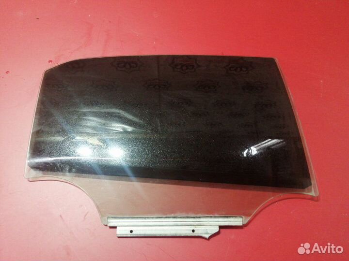 Стекло двери заднее правое Toyota Corolla E150