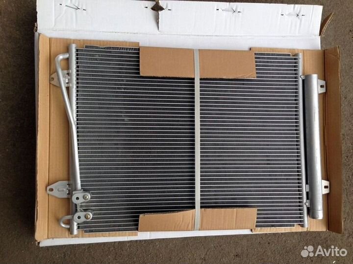 Радиатор кондиционера Опель Астра J g джей 2010