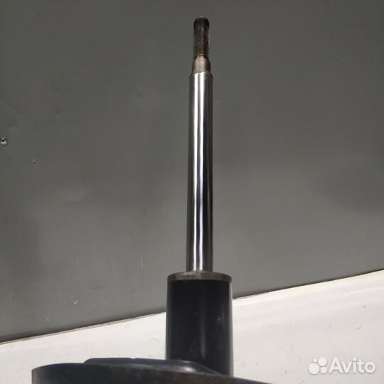 Передний левый амортизатор Renault Logan 2