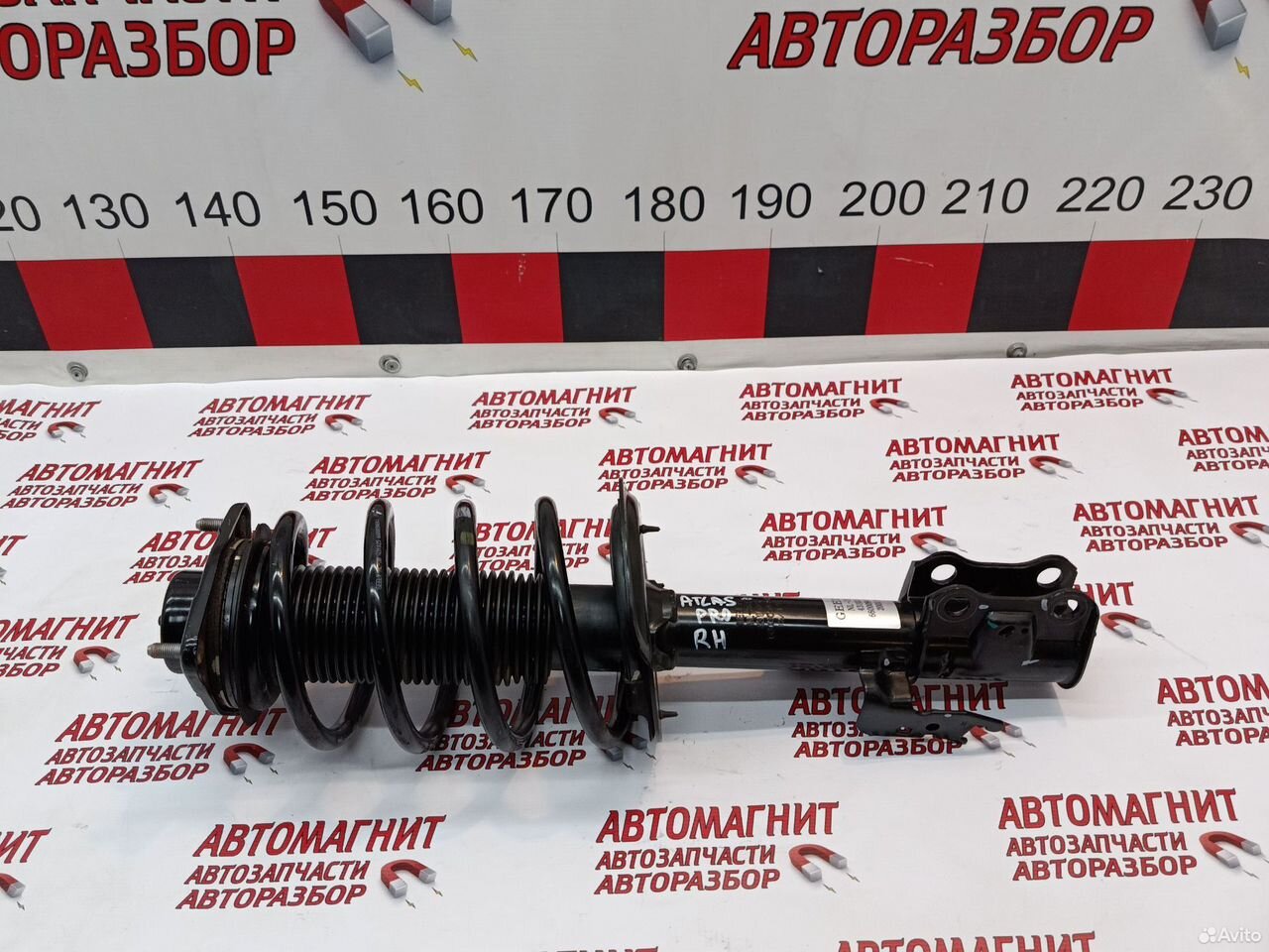 Стойка амортизатор передний правый Джили Атлас Про