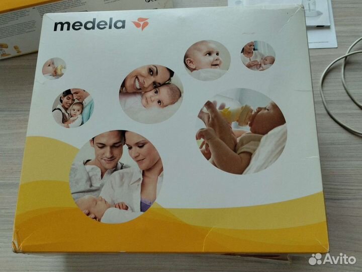 Молокоотсос medela электрический