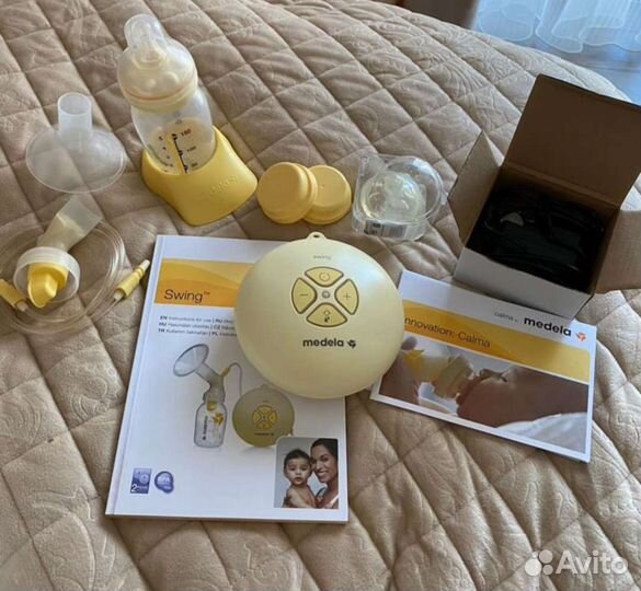 Молокоотсос medela swing электрический
