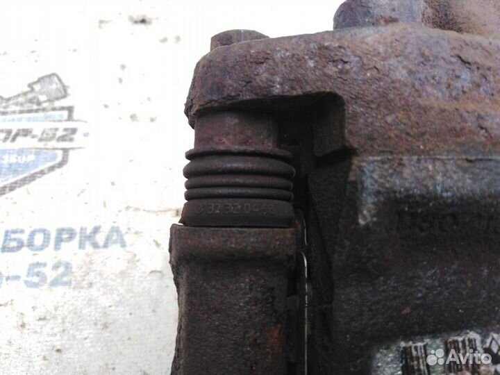 Суппорт тормозной передний левый Renault Sandero 1