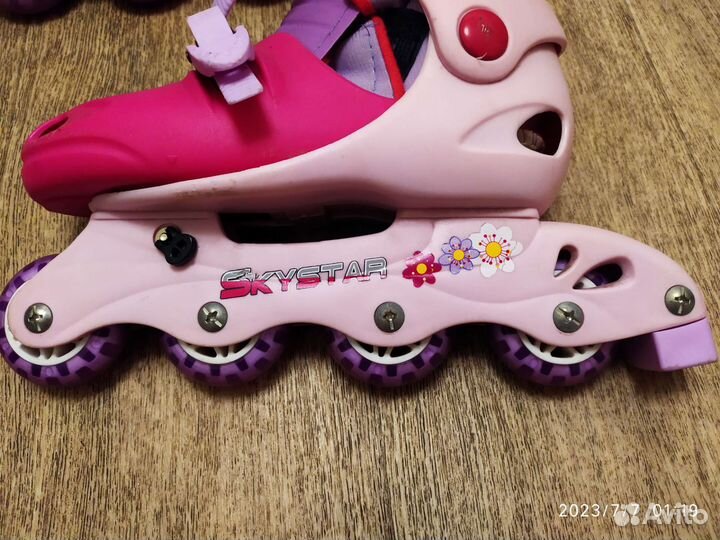 Роликовые коньки