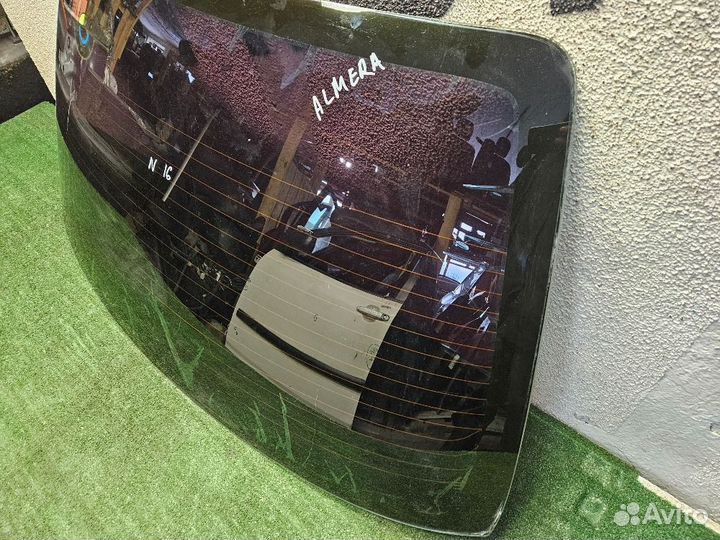 Стекло заднее на Nissan Almera N16