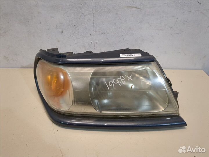 Фара (передняя) Mitsubishi Montero Sport / Pajero