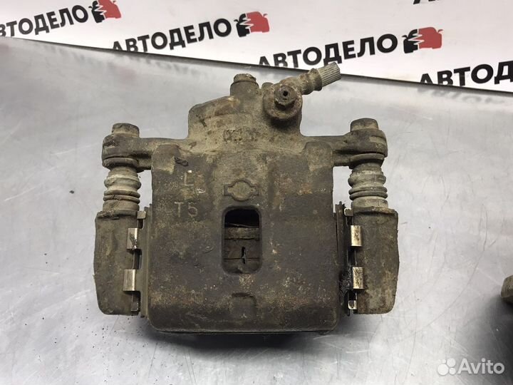 Суппорт передний левый Nissan Presea R10 1992 г.в