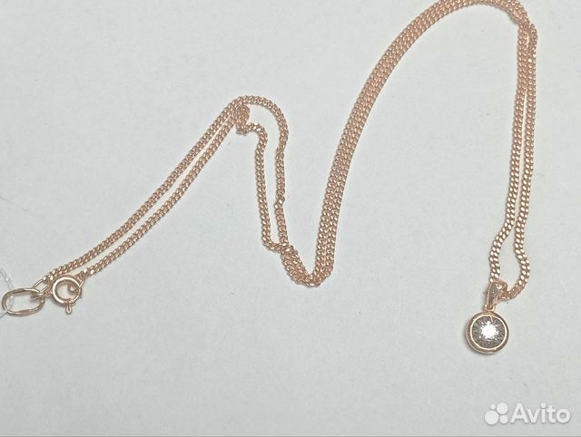 Золотое колье с камнем