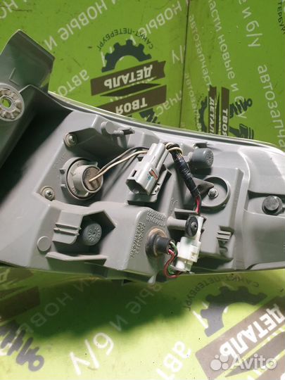 Фонарь левый Subaru Impreza GH3 G12