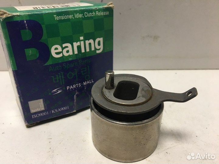 Ролик-натяжитель ремня грм Chevrolet Aveo (T250)