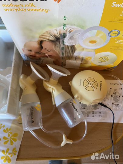 Молокоотсос medela swing maxi flex