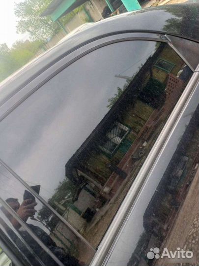 Стекло двери заднее левое Kia Cerato 2003-2007