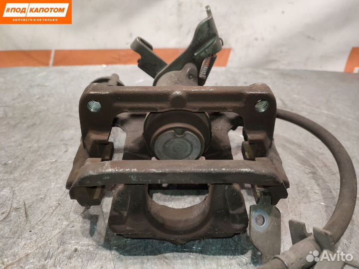 Суппорт тормозной задний левый Chevrolet Cruze