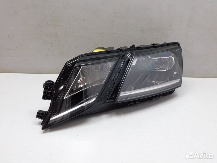 Фара левая Skoda Octavia
