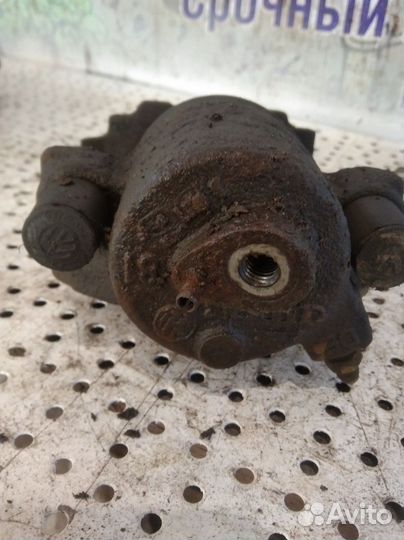 Суппорт тормозной передний левый Volkswagen Golf