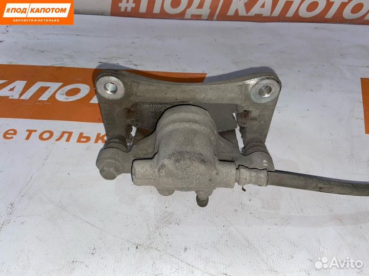 Суппорт тормозной задний правый Mitsubishi Lancer