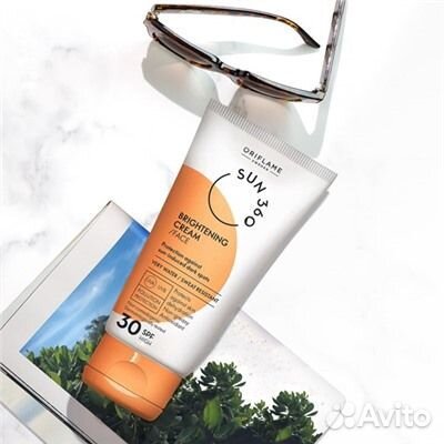 Солнцезащитный осветляющий крем для лица