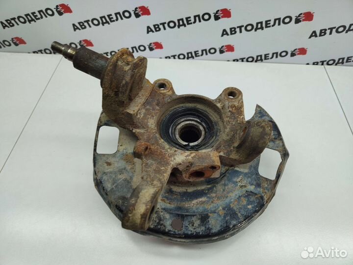 Ступица левая с кулаком Nissan Primera P11