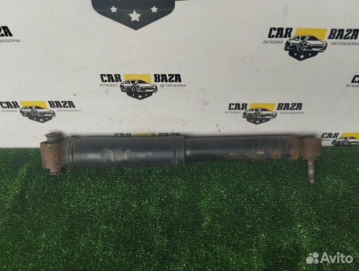 Амортизатор задний левый