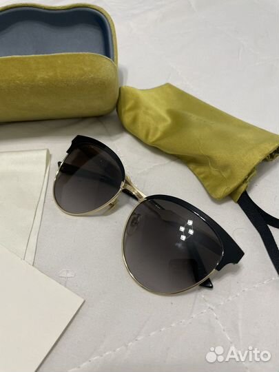 Солнцезащитные очки Gucci