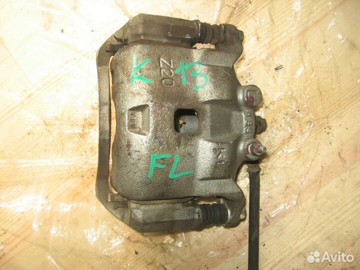 Суппорт перед лево Nissan K13 march контрактный