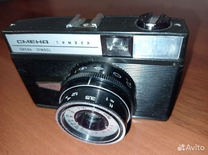 Фотоаппарат Смена Символ