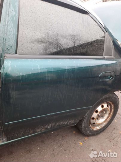 Задняя левая дверь kia sephia 2