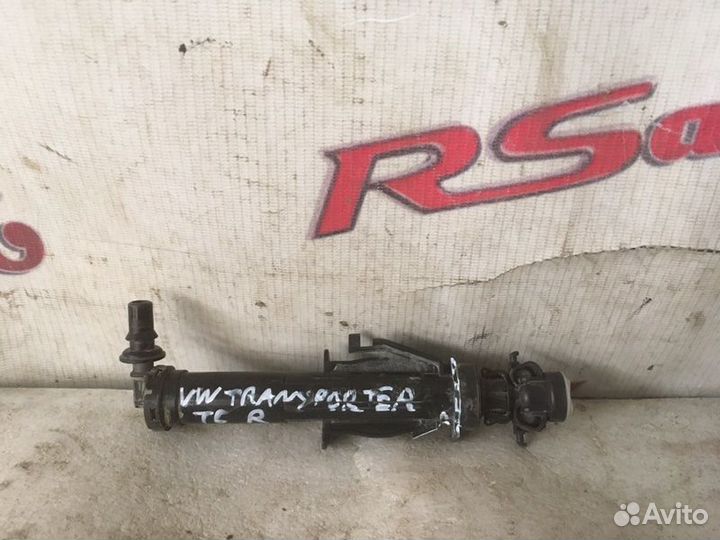 Форсунка омывателя фары правая Volkswagen