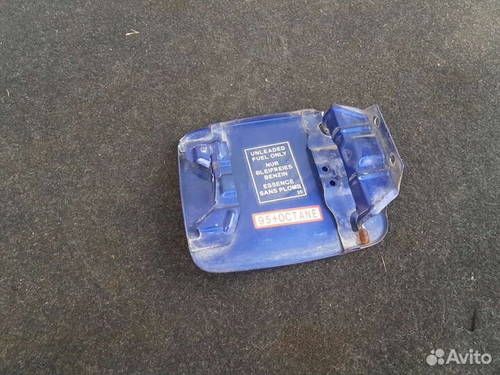 Лючок бензобака Mitsubishi Outlander 1