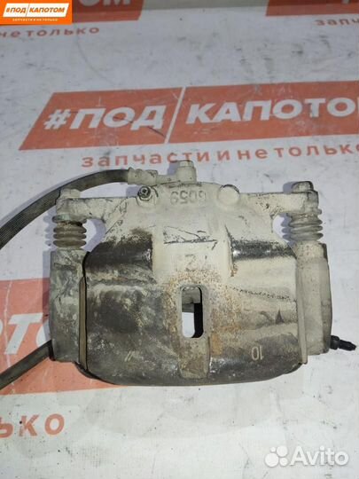 Суппорт тормозной передний правый Nissan X-Trail