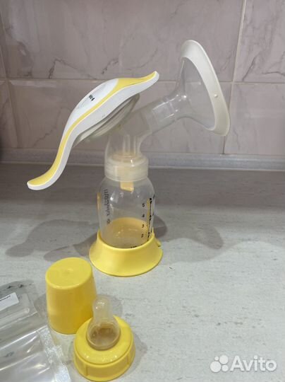 Молокоотсос medela ручной