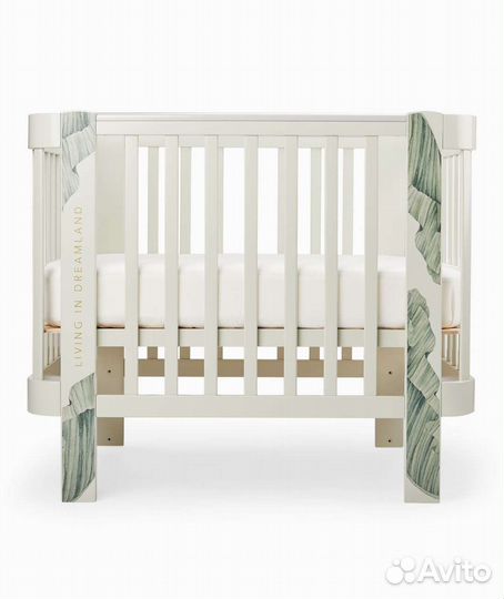 Детская кроватка с продольным маятником